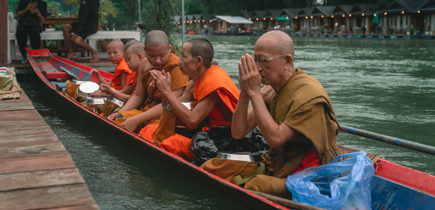 Experiencing the Serenity of Alms Giving Ceremony (Tak Bat) by Boat in Meuang Feuang